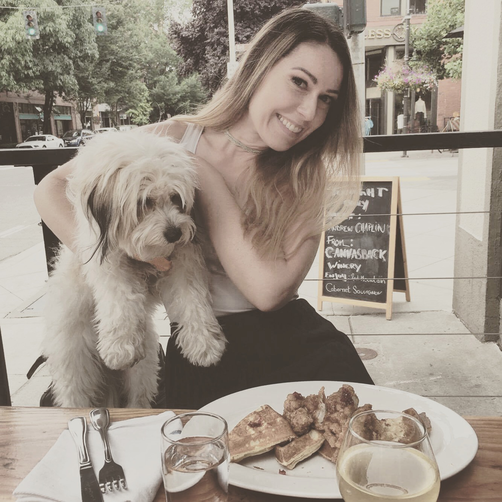 Marie and her dog having brunch at a Seattle restaurant